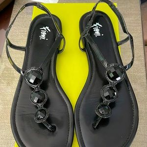 Used sandals but in excellent conditions.